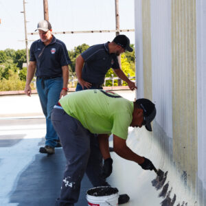 RightMark Roofing employees working.